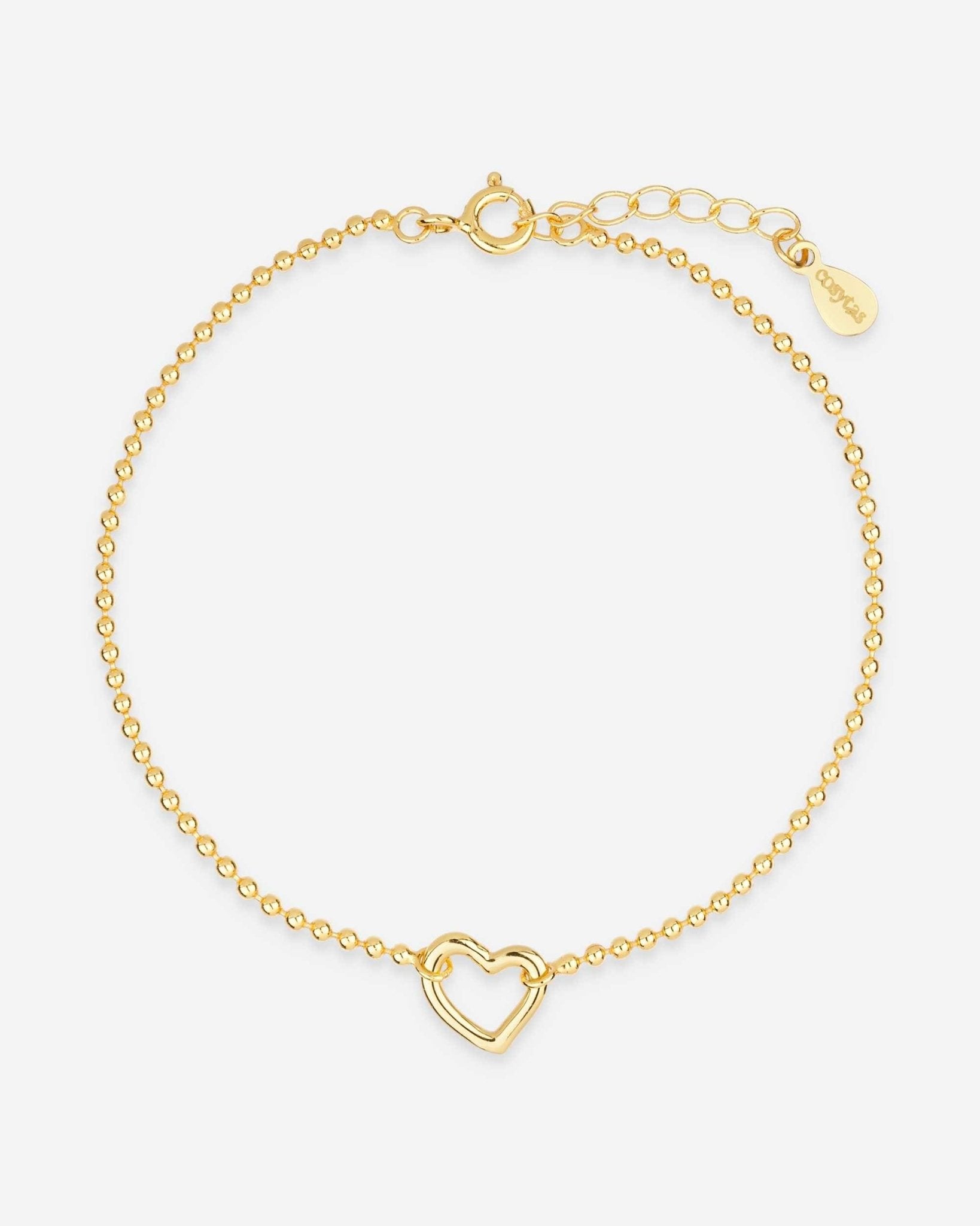 Frontansicht des Cosytas Golden Heartline Armbands mit einem herzförmigen Anhänger und vergoldeter Kugelkette