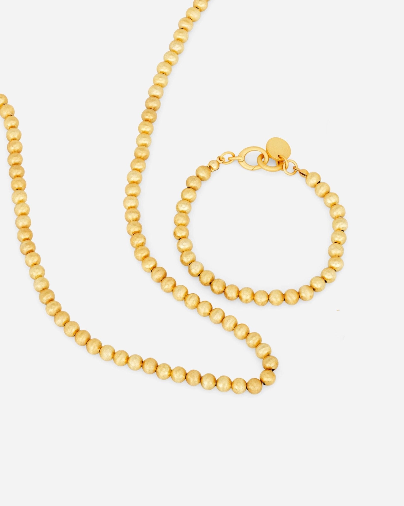 Lumina Gold Slim Sphere Duo Set, hochwertige Metalllegierung, 18k vergoldet, feine Kugelkette und Armband aus Zürich